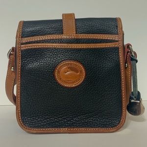 Vintage Dooney & Bourke Black Leather Flap purse.